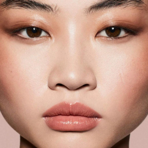 Глянцевый бальзам для губ Fenty Beauty Gloss Bomb Stix High-Shine Gloss Stick 3,6г у відтінку: 03 fenty glow